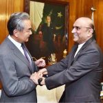 President Asif Ali Zardari shaking hands with Mr. Wang Yi, Member of the Political Bureau of the CPC Central Committee & Minister for Foreign Affairs of China, at Aiwan-e-Sadr