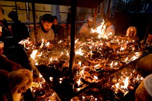 Worshipers lit-up earth lamps at Data Darbar during the 982nd Urs celebration of Data Ali Hajveri while a large number of people arrive to attend the three-day celebrations