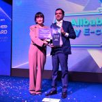 Representative of AliBaba .com giving best exporter award Pakistan KEL Award 2025 at local hotel