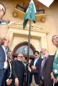 Sindh Chief Minister Syed Murad Ali Shah hoists the national flag at KCCI's restored heritage building to mark Pakistan's 78th Independence Day