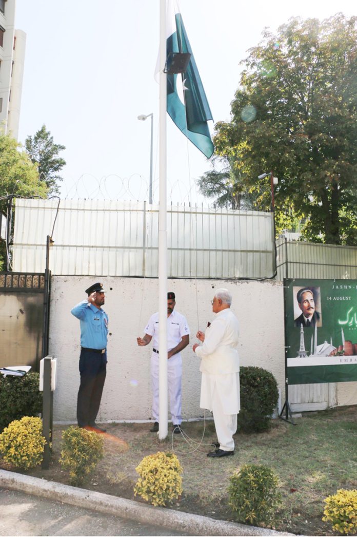 Pakistan’s Ambassador to Turkiye, Dr. Yousaf Junaid, hoists the national flag to commemorate Pakistan’s Independence Day at Embassy Of Pakistan
