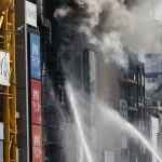 Fire breaks out at building in Osaka's popular Dotombori district