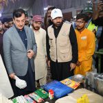 Acting President Syed Yousuf Raza Gilani inspecting relief items as Chief Guest at the distribution ceremony of essential relief packages to 300 flood-affected households, organized by the Farmers Development Organization (FDO) in collaboration with the Pakistan Poverty Alleviation Fund (PPAF) at Union Council Sher Shah