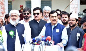 Chairman Senate Syed Yusuf Raza Gilani and Governor KP Faisal Karim Kundi, along with other dignitaries, talking to the media during the 100th annual Eid Milad-un-Nabi procession organized by Anjuman Islamia