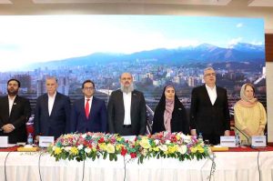 Pakistan's Federal Minister for Commerce Jam Kamal Khan and Iran's Minister for Road and Urban Development Ms. Farzaneh Sadegh, joined by senior officials from both countries, stand in solemn respect as the national anthems of Pakistan and Iran are played at the opening of the Pak-Iran Business Forum 2025.