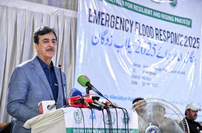 Acting President Syed Yousuf Raza Gilani addressing a gathering as Chief Guest at the distribution ceremony of essential relief packages to 300 flood-affected households, organized by the Farmers Development Organization (FDO) in collaboration with the Pakistan Poverty Alleviation Fund (PPAF) at Union Council Sher Shah