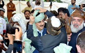 Before leading the 100th annual procession of Eid Milad-un-Nabi organized by Anjuman Islamia on 12th Rabi-ul-Awwal, Chairman Senate Syed Yusuf Raza Gilani are seen in the turban-tying ceremony honored by Sajjada-Nashin of Hazrat Musa Pak Shaheed's shrine, Syed Abu-ul-Hassan Gilani