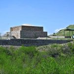 The name "Ban Faqiran" is derived from the local vernacular: "ban" (meaning reservoir) and "faqiran" (meaning saints), thus translating to "a reservoir dedicated to saints." The archaeological site, known locally by this name, is situated approximately two kilometers southwest of the Shah Allah Ditta Caves. The Buddhist stupa at Ban Faqiran dates from the 2nd to the 5th century C.E. The complex, which includes the stupa and a long staircase, covers an area of 10.15 by 26.20 meters. It was constructed using local limestone and Kanjur stone. Presently, the Ban Faqiran stupa is the largest historical Buddhist monument discovered in Islamabad. In addition to the stupa's structural remains, a variety of artifacts such as coins, pot shards, and arrowheads have been discovered at the site. The coins date from the 1st century B.C. to the late Mughal period. These artifacts are currently displayed at the Islamabad Museum, located at G-5/1 Attaturk Avenue