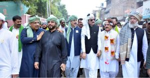 Before leading the 100th annual procession of Eid Milad-un-Nabi organized by Anjuman Islamia on 12th Rabi-ul-Awwal, Chairman Senate Syed Yusuf Raza Gilani are seen in the turban-tying ceremony honored by Sajjada-Nashin of Hazrat Musa Pak Shaheed's shrine, Syed Abu-ul-Hassan Gilani