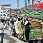 People travelling on a passenger bus in a risky way at Lehtrar Road may cause any mishap and needs the attention of concerned authorities