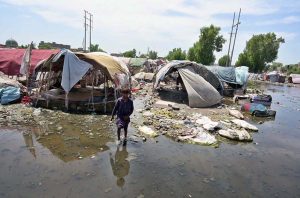 – A view of nomads' huts are submerged in rainwater at Makki Shah area needs the attention of concerned authorities.