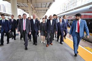 President of Pakistan, Asif Ali Zardari being briefed on the operations of the high-speed train during his journey from Chengdu to Mianyang.
