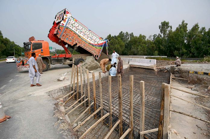 Ongoing repair and construction work on the motorway near Charsadda Interchange to ensure smooth traffic flow