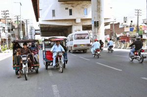 Tricycle rickshaw drivers violating one-way traffic in Samanabad risk causing accidents and need authorities' attention.