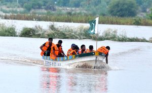 Rescue 1122 officials are engaged in the evacuation of people stranded by the rising floodwaters of the River Chenab.