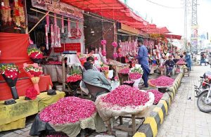 Vendors display and sells fresh flowers to attract customers at 47 adda.
