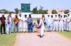 Players in action during a cricket match between Comprehensive Boys Higher Secondary School and Beaconhouse School teams as part of the Inter-School PCB Talent Hunt Program at Niaz Cricket Stadium.