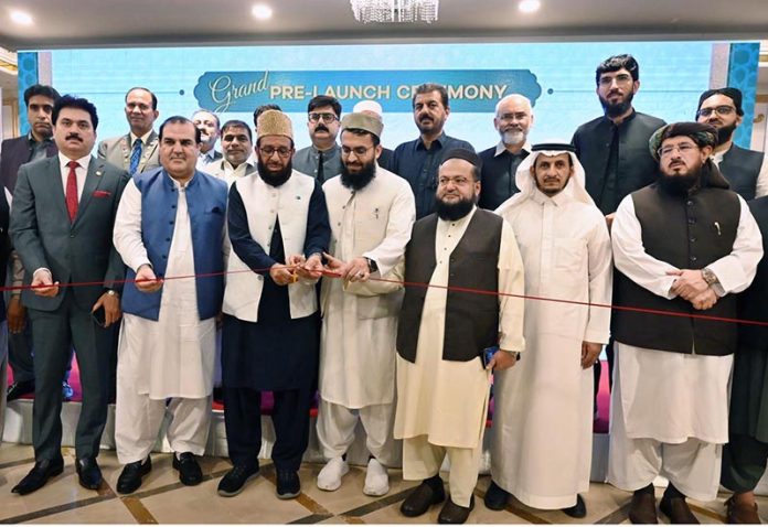 Federal Minister for Religious Affairs and Interfaith Harmony Sardar Muhammad Yousaf cutting ribbon to pre launch of the 3rd Pakistan Hajj & Umrah Exhibition 2025
