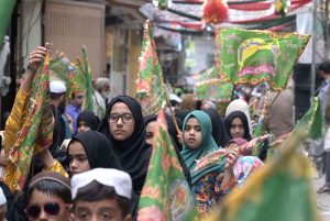 A large number of children participate in a rally in connection with Eid Milad-un-Nabi (SAWW) celebrations organized by Madrasa Siddiquia Mehria Madina Town, Dhoke Do Lal