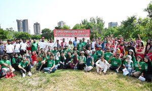 Chairperson Pakistan Red Crescent Society (PRCS), Mrs. Farzhana Naek distributing cycles to PRCS volunteer persons during Zero Emission Day "Pedal For The Planet" Cycling Rally at Jinnah Avenue near China Chowk to National Press Club