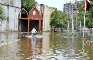 A youngster dives into accumulated rainwater to enjoy swimming at Abbas Bhai Park after heavy showers lashed the city.