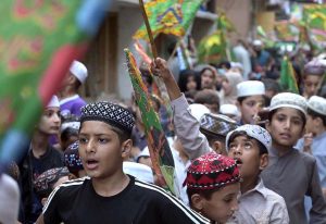 A large number of children participate in a rally in connection with Eid Milad-un-Nabi (SAWW) celebrations organized by Madrasa Siddiquia Mehria Madina Town, Dhoke Do Lal