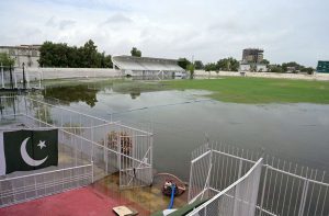 A youngster dives into accumulated rainwater to enjoy swimming at Abbas Bhai Park after heavy showers lashed the city.