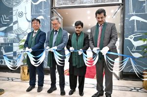 Minister of State for National Heritage & Culture Division Huzifa Rehman unveiling plaque during opening ceremony of Digital Immersive Gallery at Islamabad Museum