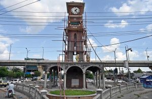 Labourers are busy repairing work of Clock Tower at RehmanAbad.
