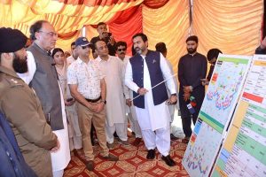 Federal Minister for Finance and Revenue Senator Muhammad Aurangzeb is talking to media person during visiting flood-hit areas.