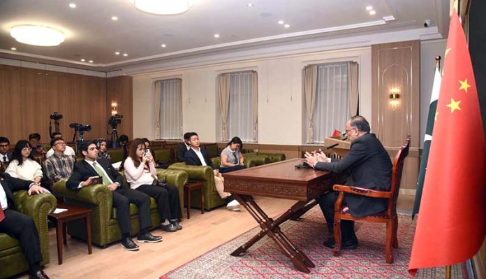 Federal Minister for Planning, Development and Special Initiatives Prof. Ahsan Iqbal talking to the Chinese media about his visit at the Pakistan Embassy