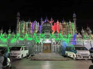 A beautifully illuminated view of Haji Baba Hayat Jama-e-Masjid, decorated with colorful lights in connection with the holy month of Rabi-ul-Awwal, at Phatan Colony