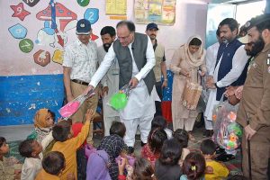 Federal Minister for Finance and Revenue Senator Muhammad Aurangzeb is distributing ration among the flood-stricken families during his visit to Ration Distribution Center.