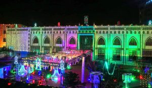A beautifully illuminated view of Haji Baba Hayat Jama-e-Masjid, decorated with colorful lights in connection with the holy month of Rabi-ul-Awwal, at Phatan Colony