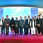 Minister of State for National Heritage & Culture Division Huzifa Rehman in a group photograph during opening ceremony of Digital Immersive Gallery at Islamabad Museum
