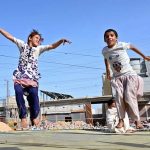 Children enjoying on jumping-jack at Sadeeqi Colony