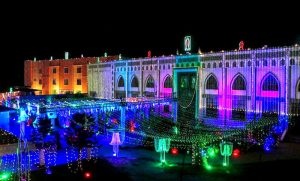A beautifully illuminated view of Haji Baba Hayat Jama-e-Masjid, decorated with colorful lights in connection with the holy month of Rabi-ul-Awwal, at Phatan Colony
