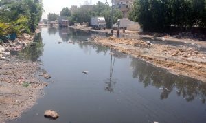 - A scene of devastation in Korangi area’s PMT Society, where contaminated rainwater has inundated the locality, highlighting persistent sanitation issues caused by poor drainage and inadequate infrastructure.
