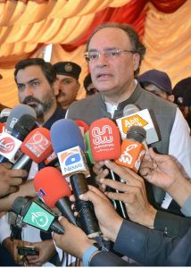Federal Minister for Finance and Revenue Senator Muhammad Aurangzeb is talking to media person during visiting flood-hit areas.