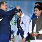 Divisional Commissioner Raja Jahangir Anwar awards gold medals and certificates to position holders during the Intermediate result announcement ceremony at Shehzad Hall of Divisional Model College