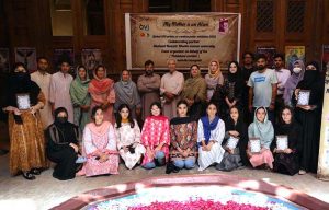 Female visitors take interest in display posters during the exhibition “My Mother is an Alien”, organized in collaboration with Shaheed Benazir Bhutto Women University, Pakistan curator of 6vi, and event organizer Abiha Mahdia at the historic Sethi House.