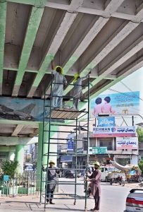 PHA workers busy in panting Kalma chowk fly over.