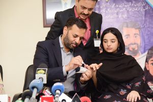 Lady Health Workers administering an HPV vaccine to the daughter of Federal Health Minister, Syed Mustafa Kamal, at the DRAP Office as part of efforts to counter propaganda against vaccination