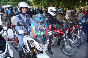 Traffic police women riding bikes after the inauguration of the Women’s Bike Rally at D-Ground.