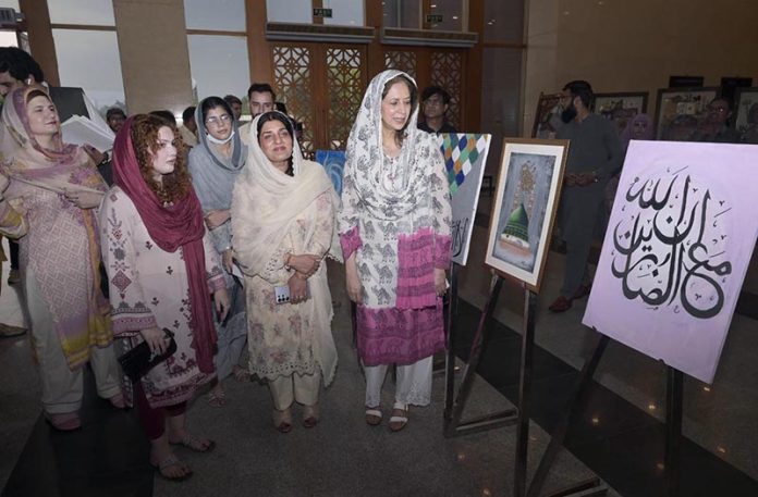 Federal Secretary for Information and Broadcasting, Ambreen Jan, visits the calligraphy exhibition after inaugurating the event at the Pak-China Center, organized by the Directorate of Electronic Media & Publications (DEMP) in observance of the 1500th Eid Milad-un-Nabi