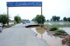 view of damaged Lalian Road after a flash flood hit Village Kalri Zero Point, Tehsil Bhuwana, near River Chenab, displacing thousands and disrupting daily life.