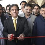 Federal Minister for Railways, Muhammad Hanif Abbasi cutting ribbon to inaugurate new rake of railcar at Rawalpindi Railway Station