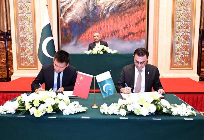 President Asif Ali Zardari witnessing the signing of an MoU between Mr Zhu Hao of Sichuan Chuanxiao Fire Trucks Manufacturing Company and Dr Ammad Hussain, Director of ASM Services, establishing a framework for cooperation in supply, distribution, sales, and after-sales services of fire trucks and advanced emergency equipment for Pakistan