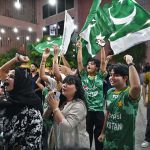 People are watching the Asia Cup T20 final cricket match between India and Pakistan on a big screen at the Arts Council