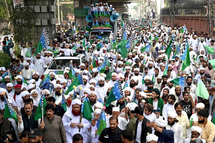 Punjab Governor Sardar Saleem Haider leads while a large number of people participate in a religious procession to celebrate Eid-e-Milad-un-Nabi(S.A.AW), which commemorates the birth anniversary of Prophet Muhammad(PBUH)